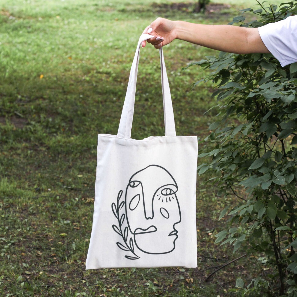 91072656 Сумка для покупок Art Face And Leaves 30x40 см текстиль цвет белый STLM-0469371 NOBRAND