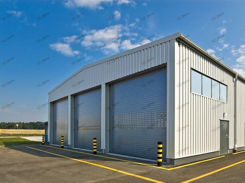 WISNIOWSKI Вертикальная раздвижная дверь Portoni sezionali industriali sun-id-1473992