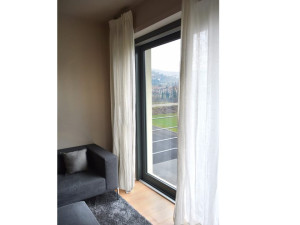 Раздвижные деревянные–алюминиевые двери-окна