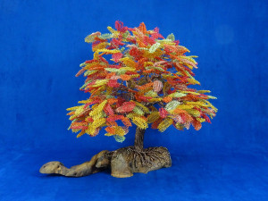 Скульптура из алюминия и оливкового дерева