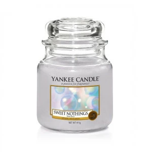 Свеча средняя в стеклянной банке "Сладость" Sweet nothings 411 гр 65-90 часов YANKEE CANDLE  268014 Фиолетовый